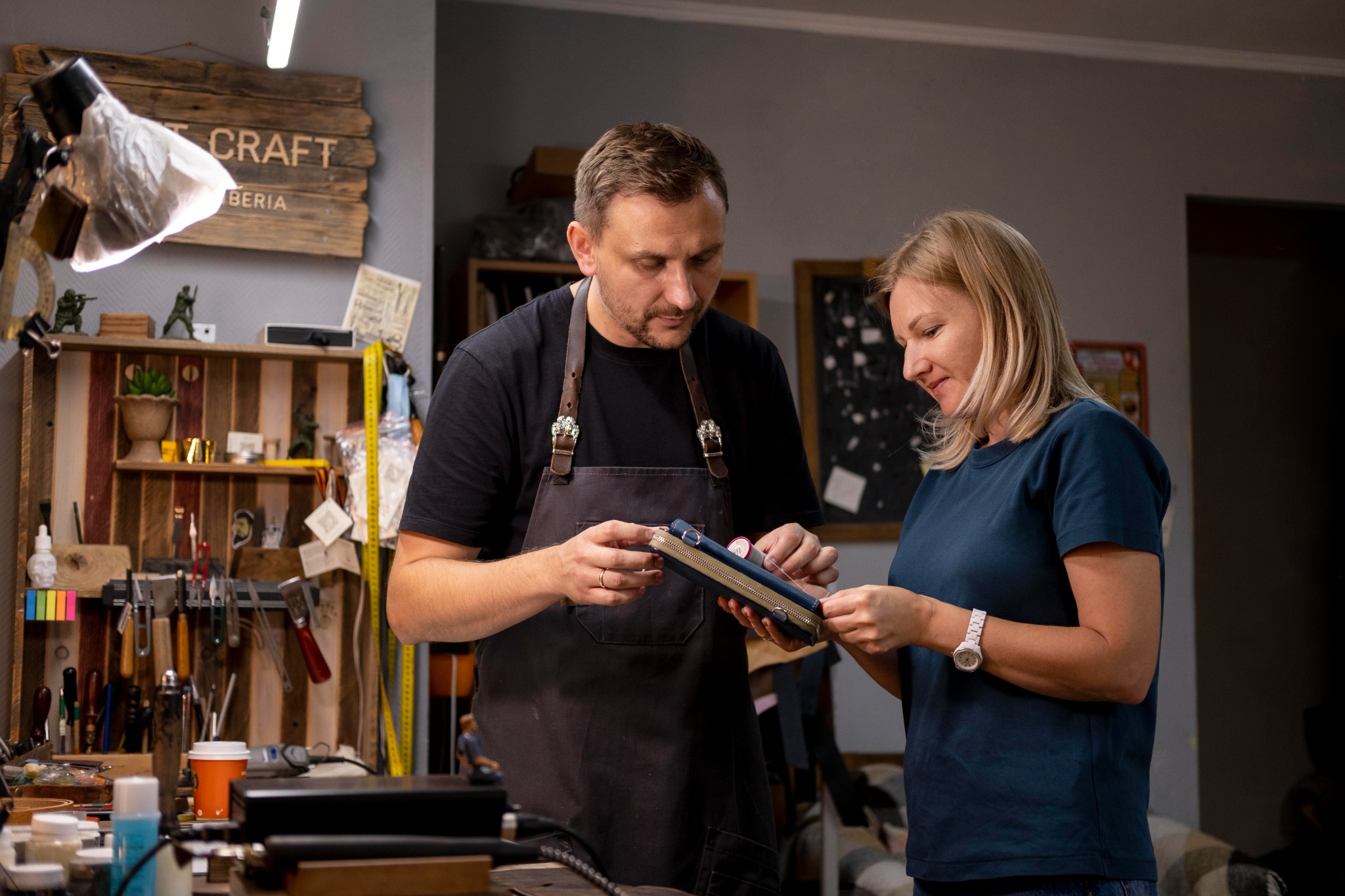 A small business team discussing their craft in a workshop